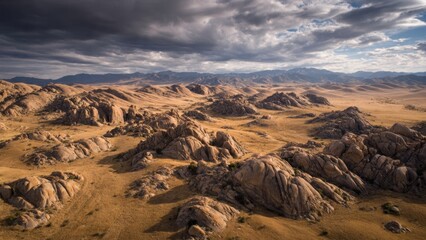 Obraz premium Desert Landscape with Rock Formations and Clouds