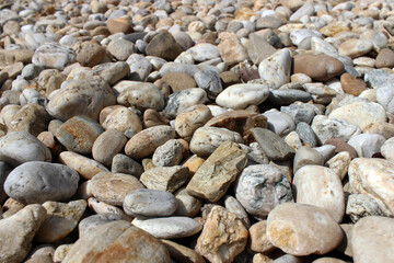 Background with pebbles on the beach