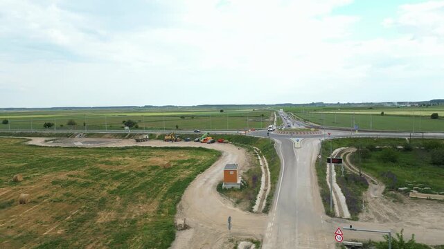 Roundabout At Jijila Link Road Near Braila Bridge In Romania. Aerial Ascending Shot