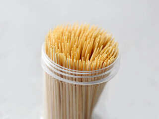 Jar of bamboo toothpicks, oral hygiene.