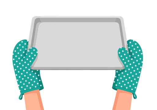 A pair of hands wearing teal, white-polka-dotted oven mitts holds up an empty, rectangular silver baking tray, ready for culinary use against a plain white background