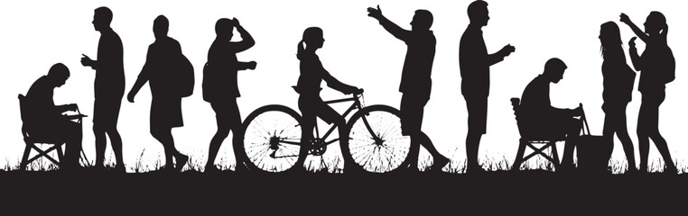 Obraz premium Diverse group of people in silhouette on a grassy field