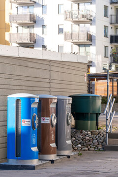 Urban street recycling container for waste sorting and trash collection supporting sustainable environment infrastructure near apartments