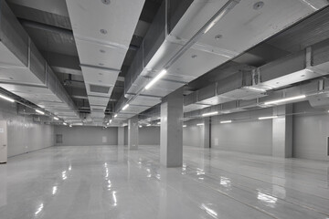 Perspective view of a vast empty industrial storage facility