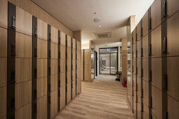 Modern locker room interior with wooden lockers and clean design