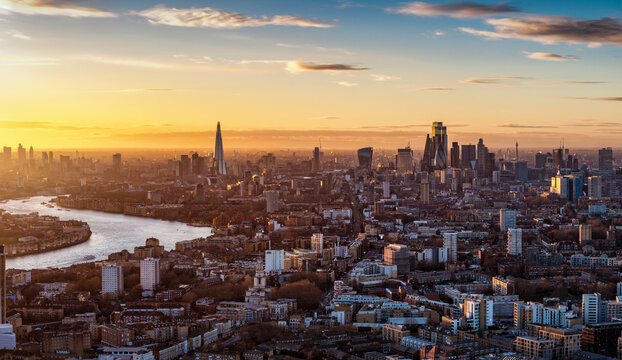 Elevated, panoramic view of the London skyline during sunset time