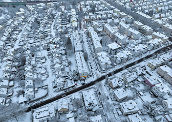 Aerial photo of a snowy area with residential buldings in the city of Kornwestheim in Baden-Wuerttemberg, Germany
