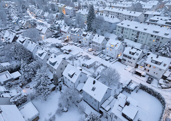 Aerial photo of a snowy area with residential buldings in the city of Kornwestheim in Baden-Wuerttemberg, Germany

