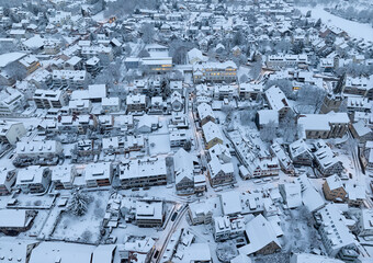 Aerial photo of a snowy area with residential buldings in the city of Kornwestheim in Baden-Wuerttemberg, Germany
