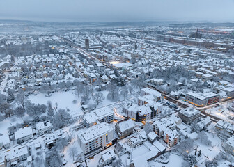 Aerial photo of a snowy area with residential buldings in the city of Kornwestheim in Baden-Wuerttemberg, Germany
