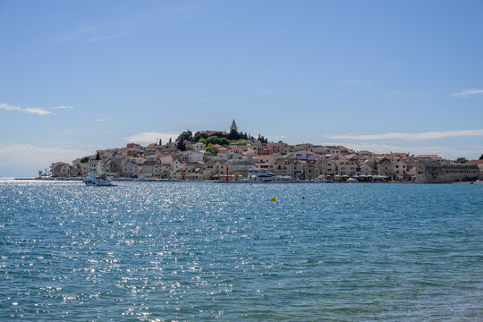 Waterfront of Primosten with hilltop church in Croatia