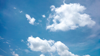 Fototapeta premium Background of beautiful, bright, cloudy blue sky with many clouds, sunny weather during the day during summer in tropical country