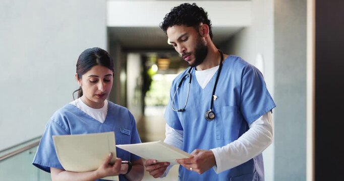 Doctors, discussion and people with report, hospital or teamwork with paperwork for medical research. Clinic, healthcare and advice for treatment plan with patient records, man and woman with file