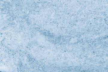 Ice texture crystal background. Textured, crunchy, frosty blue surface of ice.
