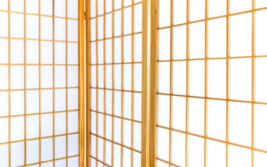 Blurred background of Japanese shoji screen made of wood and white paper. Minimal and calm interior background, perfect for zen, spa, wellness, and interior design concepts