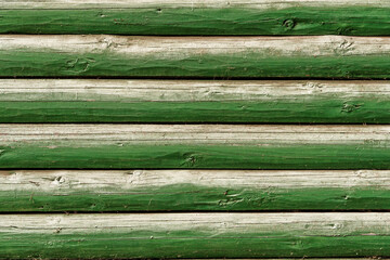 Obraz premium background of old weathered and cracked boards with peeling paint of green color