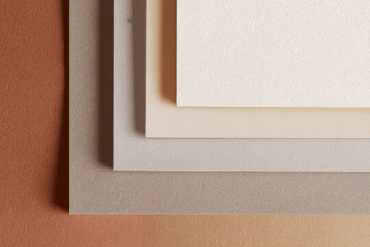 Paper transition scene with staggered paper layers fading into blank background, calm neutral tones, modern stock aesthetic