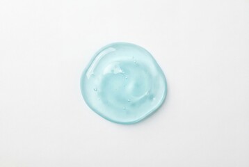 Light blue transparent cosmetic gel sample in organic blob shape