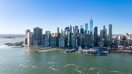 Lower Manhattan skyline over Hudson River. Wide aerial panorama of Lower Manhattan and Hudson River waterfront. © Vadim