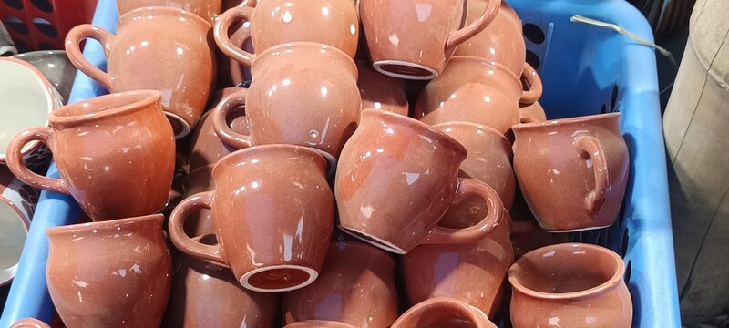 These are handcrafted ceramic kullad cups. 
They are typically made of ceramic or clay terracotta. 