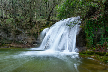 Fototapeta premium Waterfalls of the Hijuela River in Irus, in the Mena Valley. Merindades region. Burgos. Castile and León. Spain. Europe