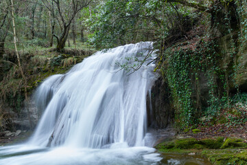 Fototapeta premium Waterfalls of the Hijuela River in Irus, in the Mena Valley. Merindades region. Burgos. Castile and León. Spain. Europe