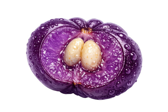 Java plum fruit cut in half, showcasing vibrant purple pulp, two white seeds, and water droplets on its wet skin