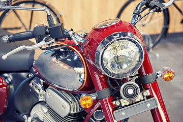 Headlamp of red retro motorcycle