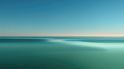 Obraz premium Tranquil Seascape with Soft Blue Tones and Gentle Horizon at Dusk