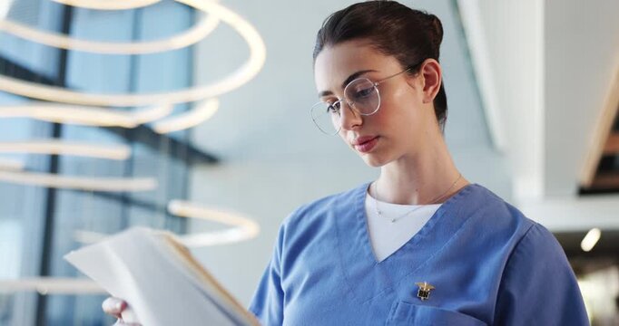 Nurse, documents and review with woman in hospital for treatment plan, patient history or medical research. Healthcare results, insurance paperwork or low angle with person for doctor referral