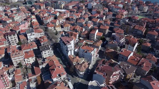 View from a height of the city of Pomorie with many cars, houses and hotels