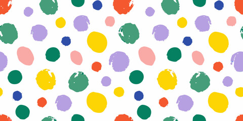 Colorful abstract pattern of irregularly shaped paint blots on white