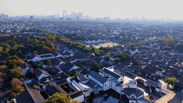 Aerial view of Suzhou Museum and Pingjiang Road in the old city of Suzhou, Jiangsu Province, China.
