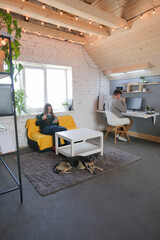 man and woman working from home, having coffee break