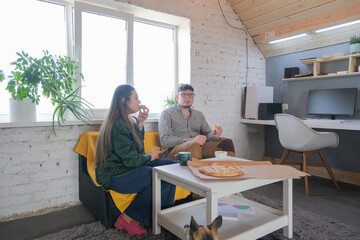 man and woman working from home, having coffee break