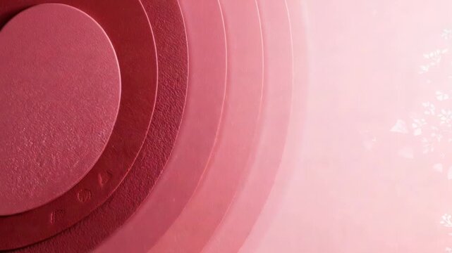 Animating nested rings shifting inward and scaling on pink backdrop, with hearts motif, copy space