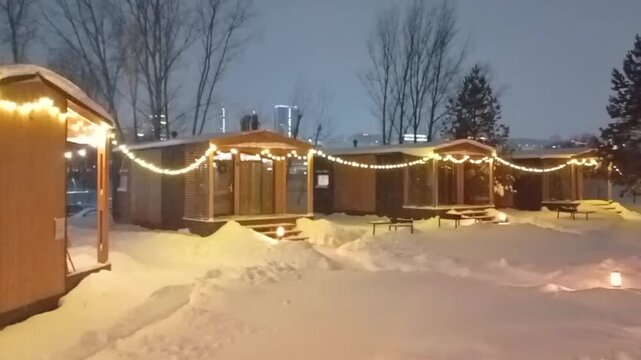A winter night under the stars in a cabin in the woods