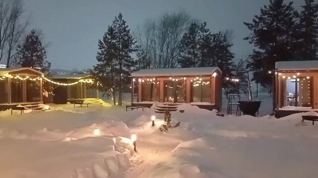 A winter night under the stars in a cabin in the woods