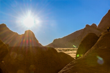 Rocky desert boulders and weathered stone formations in Namibia © Chris