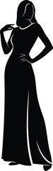 Silhouette of a woman in a long dress standing confidently