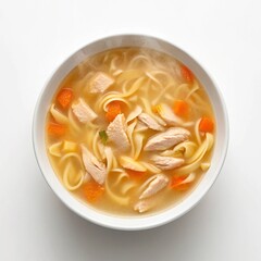 A delicious and comforting bowl of chicken noodle soup white background.