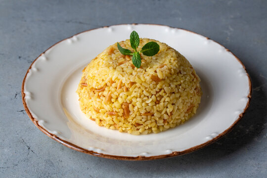 Traditional delicious Turkish food, bulgur pilaf with vermicelli (Turkish name; arpa sehriyeli bulgur pilavi)
