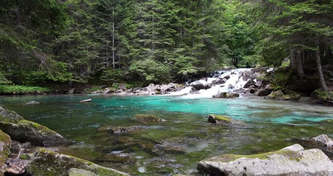 Summer landscape on the Dolomite lakes of Amola.