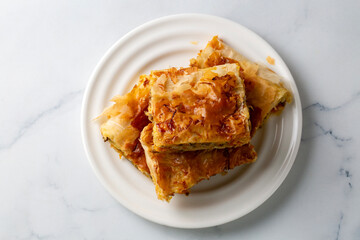 A minced meat tray pastry from Turkish cuisine. Turkish name; Kiymali tepsi boregi