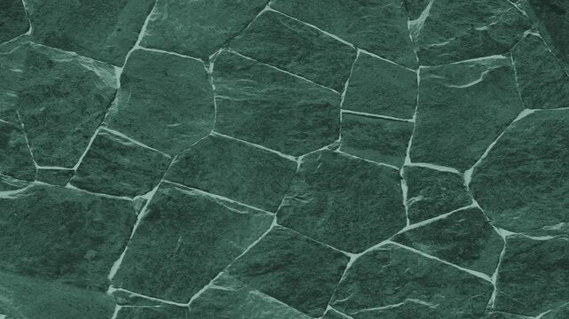 Green Natural Stone Wall Texture Background with Irregular Polygon Pattern for Architecture, Interior Design and Construction Visuals