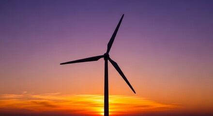 Fototapeta premium Wind turbine silhouette at vibrant sunset, purple and orange sky