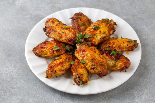 Oven-grilled chicken wings. Turkish name: Tavuk kanat
