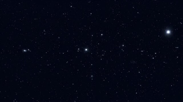 Cinematic flight through a vast starfield in deep outer space. A beautiful cosmic background with shining stars and distant constellations for a science fiction theme