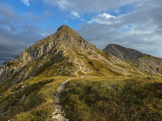 Fototapeta premium Bogatin Mountain Trail At Warm Sunset Slovenia