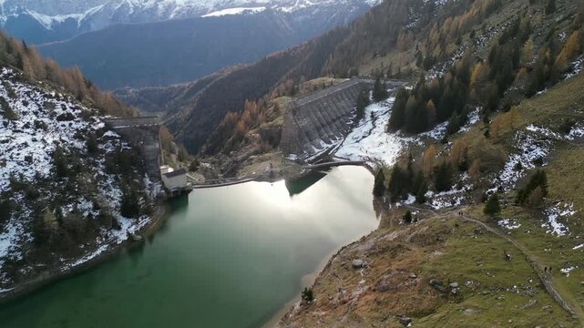 The Gleno Dam (Italy) is a historic ruin that collapsed in 1923, causing a tragic flood. Today, its impressive remains serve as a hiking destination and a powerful memorial to the disaster.